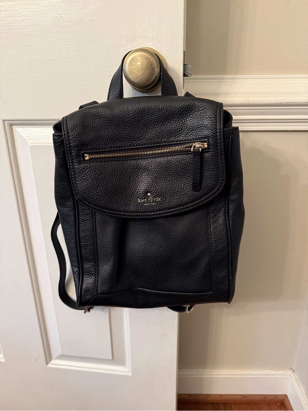 kate spade Black Pebbled Leather Flap Backpack with Gold Hardware
